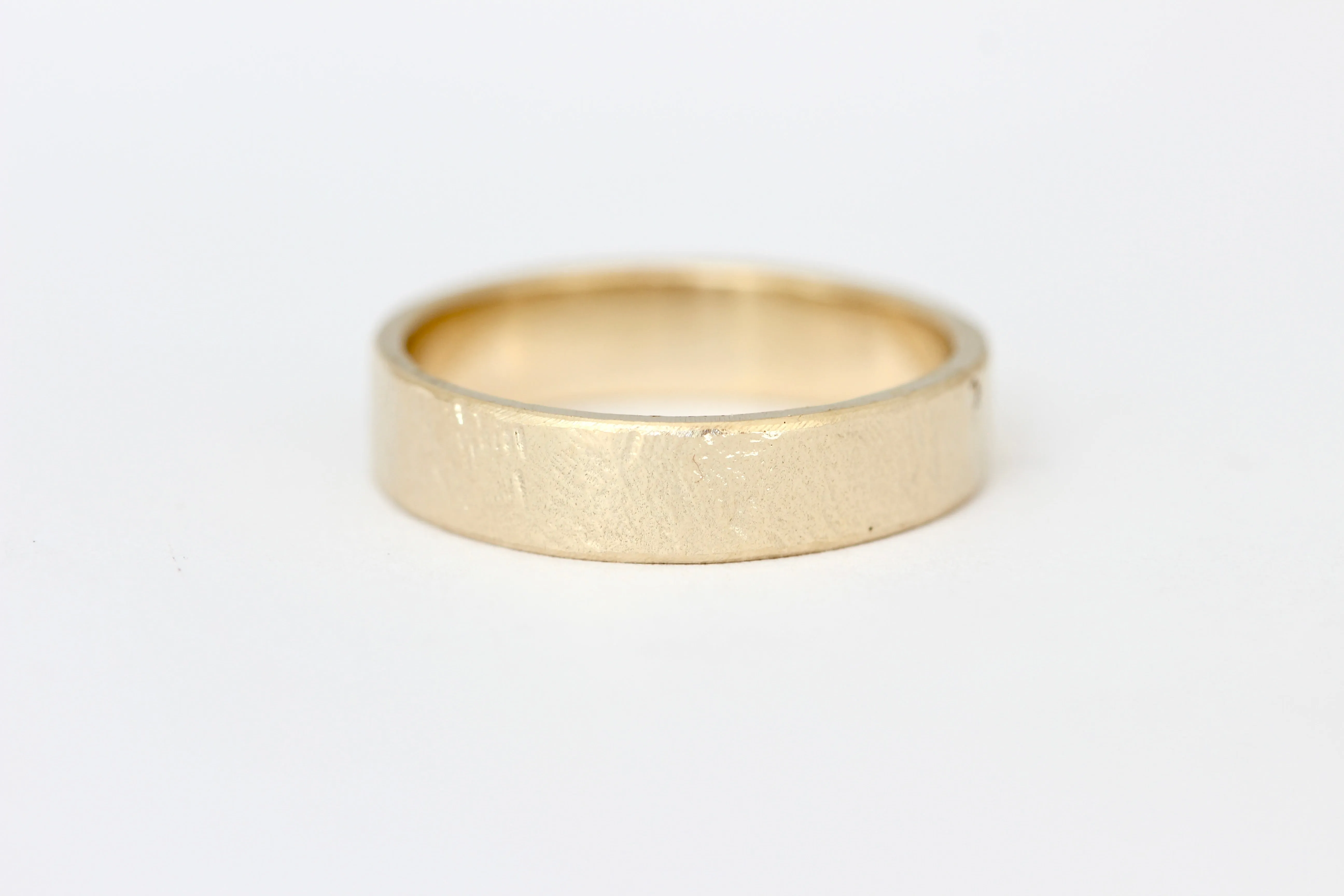 14k yellow gold wedding ring or stacker with shallow line texture