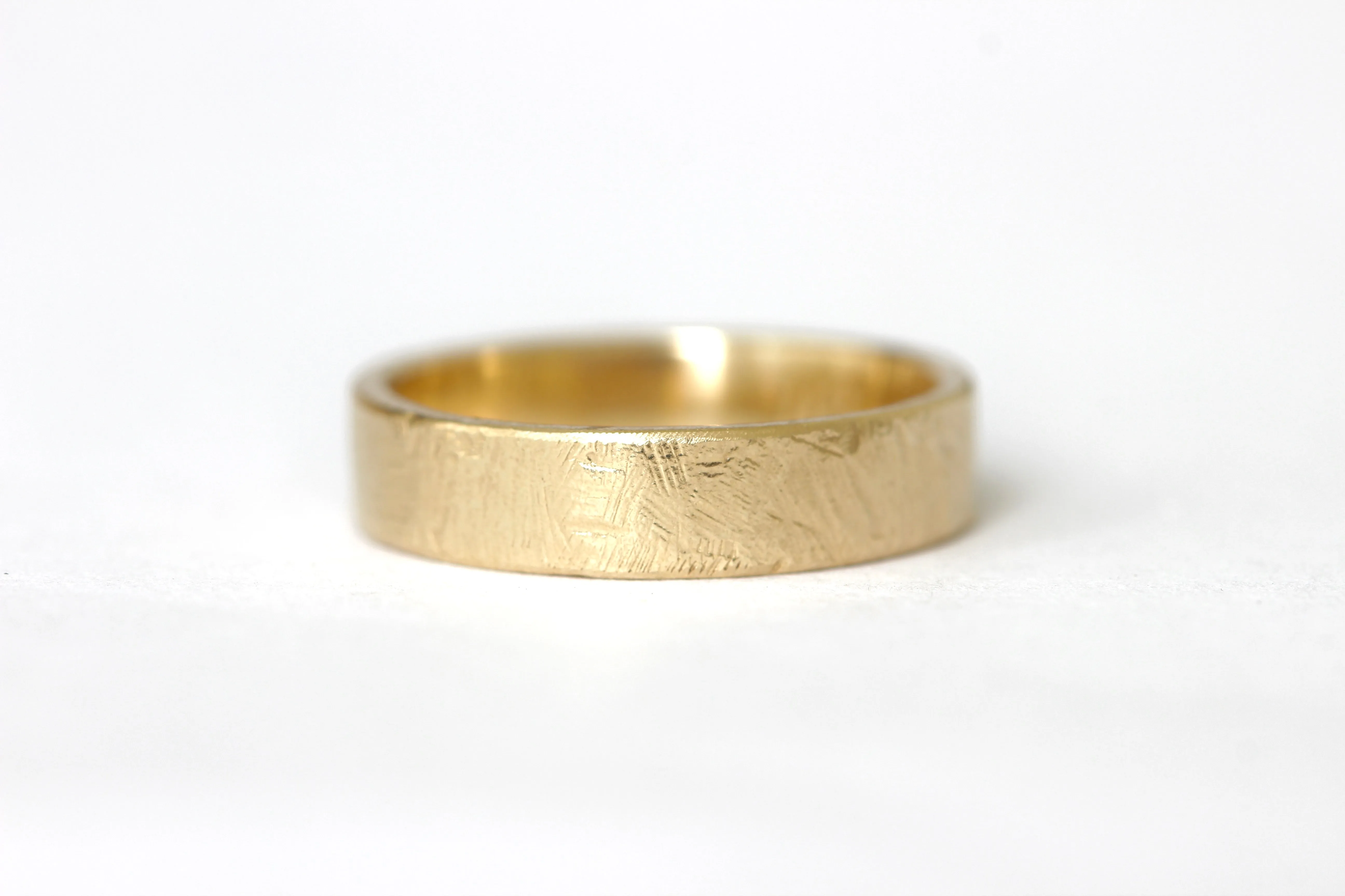 14k yellow gold wedding ring or stacker with shallow line texture