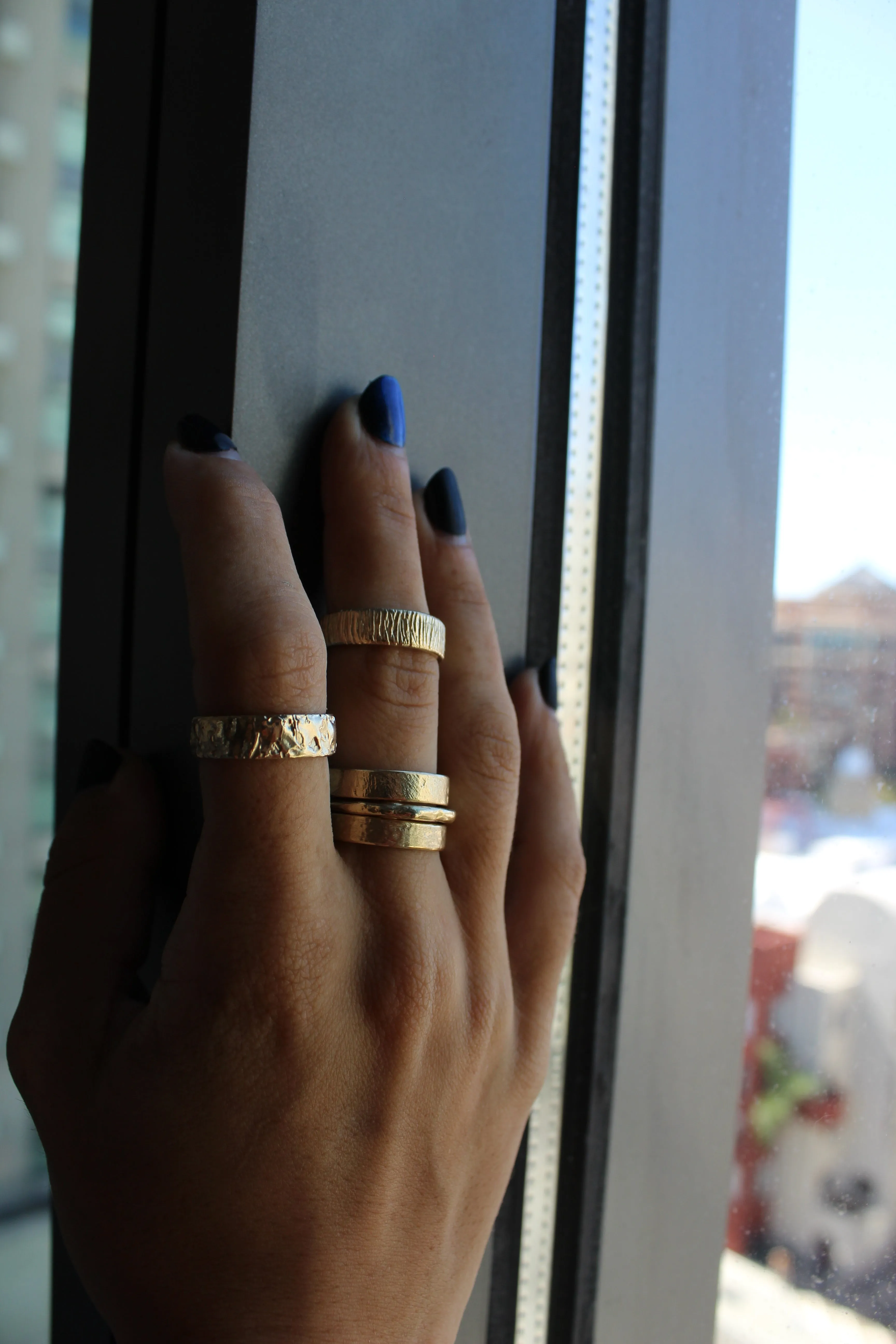 14k yellow gold wedding ring or stacker with shallow line texture