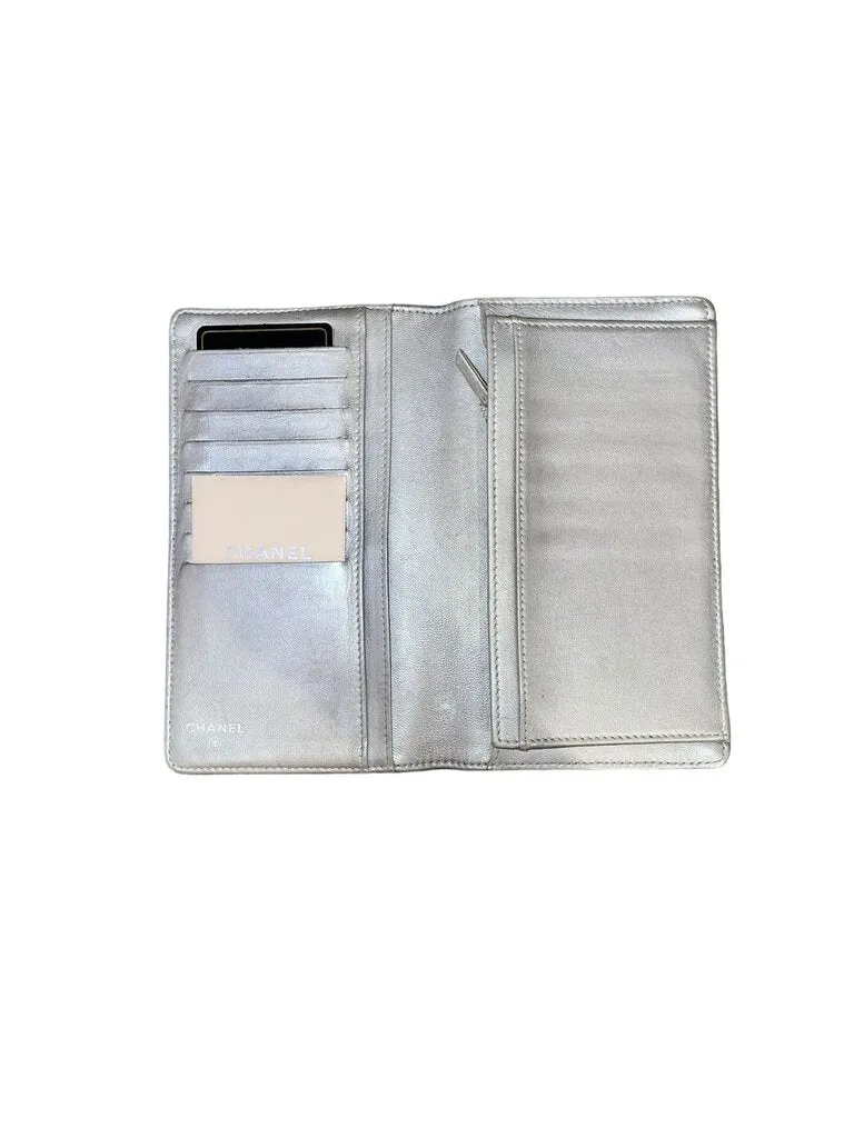 Chanel Leather Camellia Embossed Wallet purple
