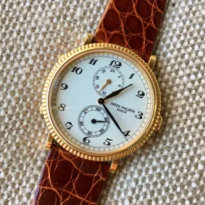 Patek Philippe Calatrava Travel Time 5034J Manual Yellow Gold Mens Watch