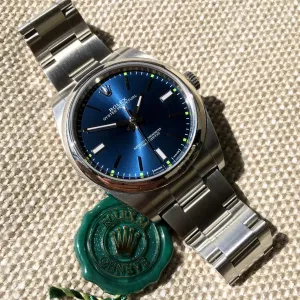 Rolex Oyster Perpetual 114300 Blue Green Stainless Steel Mens Automatic Watch